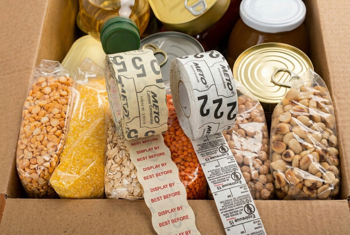 Meto custom price gun labels on top of food products